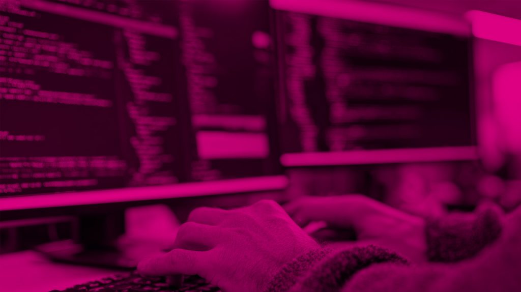 close up of a monitor with computer code